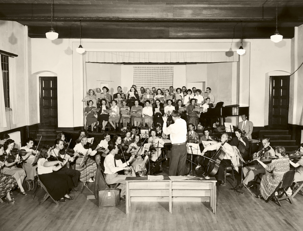 https://trinitycathedral.com/wp-content/uploads/2022/01/Choir-and-orchestra-In-Atwood-hall-1950.png